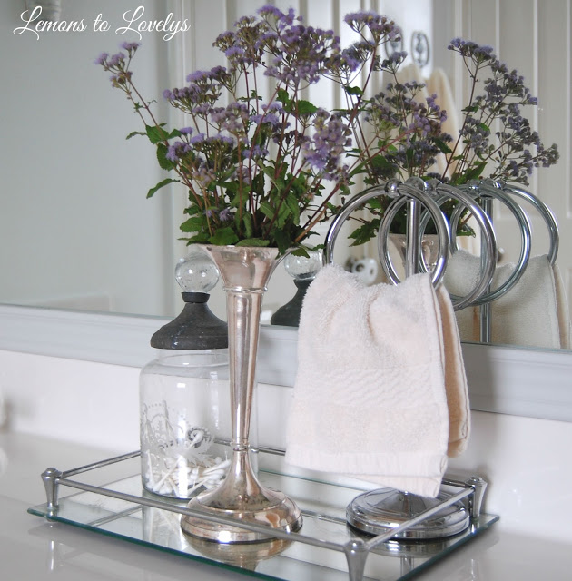 Bathroom vanity & DIY mirror frame . See more photos at lemonstolovelys.blogspot.com