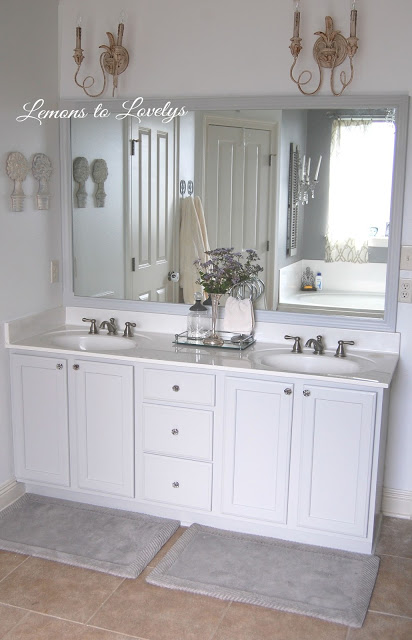 Bathroom Cabinet Makeover & DIY Mirror Frame - Paint color, Stonington Gray by BM - See more pictures on lemonstolovelys.blogspot.com