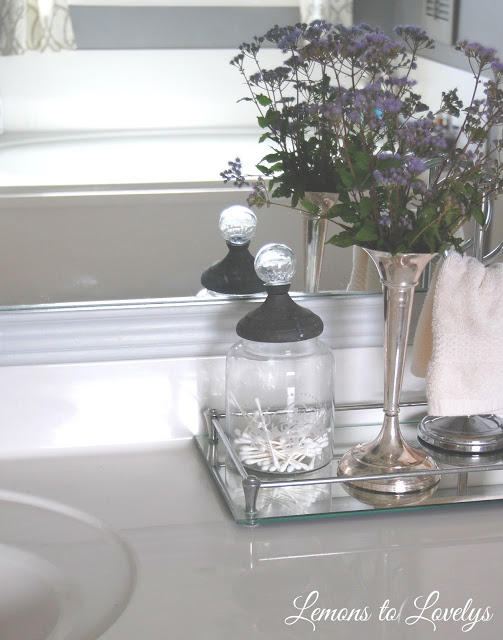 Bathroom vanity & DIY mirror frame . See more photos at lemonstolovelys.blogspot.com