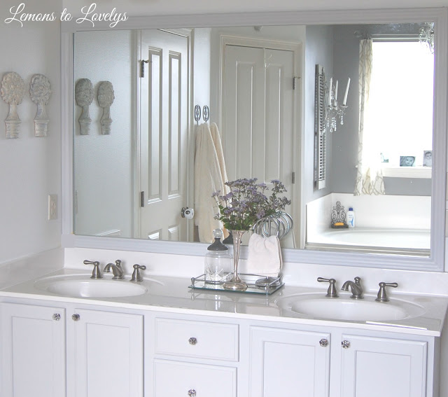 Bathroom Cabinet Makeover & DIY Mirror Frame - Paint color, Stonington Gray by BM - See more pictures on lemonstolovelys.blogspot.com