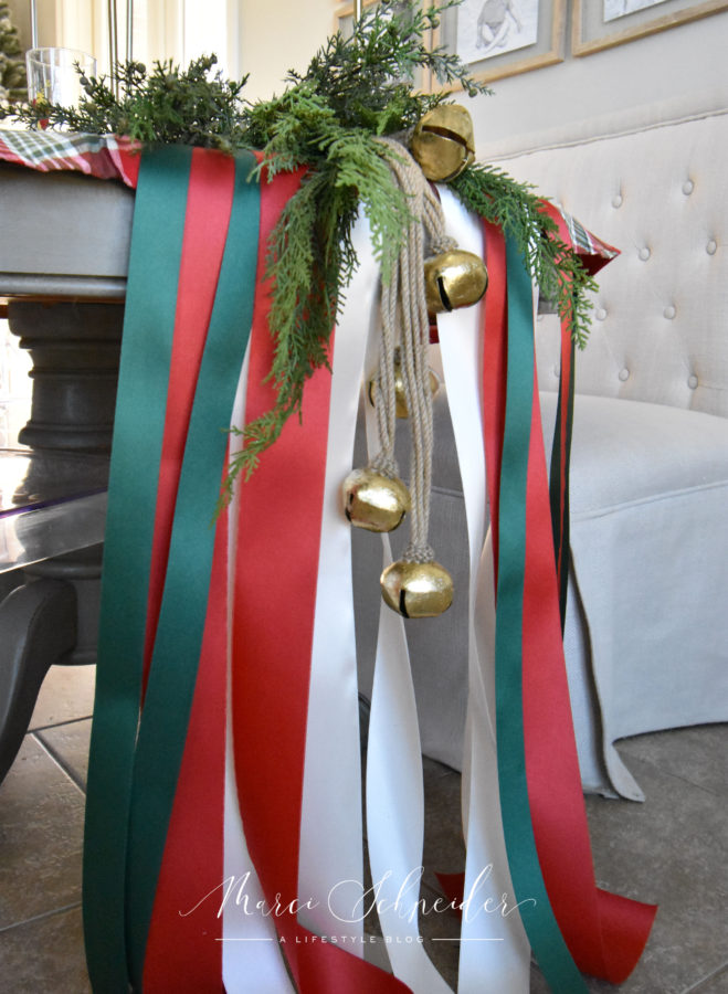 ribbons and bells on table for Christmas